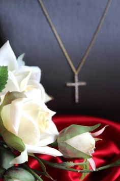 May you shine with this cross necklace. * Made in California, USA * Made to order - PENDANT SIZE * Height: 0.9370 in / 23.70mm * Width: 0.63in / 16.09mm - DIAMOND * 21 diamonds = 0.306 Ct * Clarity: VS1 - 2 * Color: F - G Color * Cut: Brilliant Cut * Stone Size: 1.5mm (the stone may be slightly small or bigger than 1.5mm) - GOLD * 14kt gold * please choose from yellow, white or rose gold - CHAIN * 14kt Gold Oval Link Elegant Cross Jewelry And Charms For First Communion, Elegant Cross-shaped Jewelry For First Communion, Elegant Cross Charms For First Communion, Diamond White Crucifix Cross Necklace For Anniversary, Diamond White Crucifix Necklace For Anniversary, Elegant Crucifix Cross Necklace For First Communion, Diamond White Cross Pendant Necklace For Anniversary, Gift Cross Necklace With Diamond Accents, White Cross Pendant Necklace For Baptism