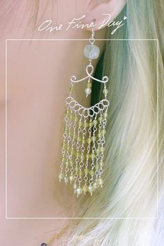 Elevate your boho style with these handcrafted peridot earrings. Adorned with crystal beads and featuring a long drop design, they offer a unique and elegant touch to any outfit. #BohoJewelry #HandcraftedEarrings #WireWrappedEarrings #GemstoneJewelry #UniqueGifts #LongDropEarrings #BohoStyle #CrystalBeads Bohemian Jade Earrings, Bohemian Hand Wrapped Dangle Earrings, Bohemian Hand-wrapped Dangle Earrings, Green Bohemian Chandelier Earrings With Dangling Beads, Bohemian Jade Earrings With Ear Wire, Green Bohemian Chandelier Earrings Nickel Free, Nickel Free Green Bohemian Chandelier Earrings, Green Nickel-free Bohemian Chandelier Earrings, Silver Bohemian Wrap Earrings