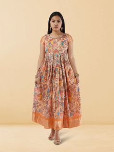 Embrace elegance in our Tranquil Threads Cream Kalankari Print Ankle Length Dress. This exquisite dress features a delicate cream Kalankari print on high-quality fabric, exuding an Indo Western charm. The ankle-length design adds a touch of sophistication, making it ideal for various occasions. Care instructions include gentle hand wash in cold water to maintain the fabric's integrity and intricate print details. Indo Western Dress, Western Dress, Ankle Length Dress, Indian Attire, Indo Western, Western Dresses, Western Outfits, Leggings Shop, Salwar Kameez