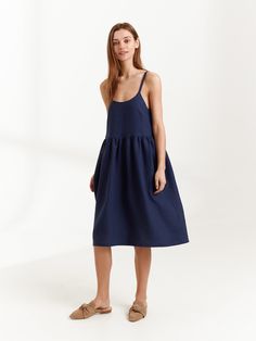 "DULCE is a linen strappy dress. DETAILS - Spaghetti straps - Below the knee length - Smock silhouette - Pockets - 100% lightweight European linen fabric - Cut and sewn to order just for you in our studio COLOR - Navy Blue, you can also choose other colors above - Fabric samples are available here https://www.etsy.com/listing/586569696/linen-fabric-samples SIZING & FIT - Fits true to size - Measurements taken from a size XS - Model is 5'8.9\" / 175cm and wearing a size XS CARE FOR LINEN - Ma Summer A-line Midi Dress With Straps, Summer Knee-length Suspender Dress With Adjustable Straps, Chic Linen Sundress With Adjustable Straps, Blue Midi Length Suspender Dress For Summer, Blue Midi Suspender Dress For Summer, Casual Strap Dresses For Daywear, Linen Sundress With Adjustable Straps For Summer, Sleeveless Linen Dress With Adjustable Straps For Brunch, Summer Dress With Spaghetti Straps Unlined