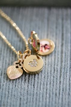 Delight your sweetheart with a one of a kind Mini 'Sweetheart' Locket. Embellished with sparkling diamonds and the finest 18k gold, it's the perfect starter piece of jewelry to become a treasured keepsake. Completely timeless and divinely crafted, it will add a sophisticated dash of sweetness to their collection. Diamond Heart Charm Necklace For Wedding, Diamond Heart Charm Jewelry With Heart Cut, Diamond Charm Necklace With Heart Pendant, Diamond Heart Pendant Necklace With Charms, Diamond Jewelry With Heart Charm, Wedding Diamond Charms Jewelry, Luxury Yellow Gold Diamond Necklace With Heart Charm, Keepsake Diamond Pendant Jewelry, Diamond Pendant Jewelry For Keepsake