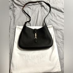 Black Leather Bag, Purchased Last Week Looking To Sell. Brand New. Only Taken Out Of The Box To Take A Pic For The Listing. Never Used. Modern Black Shoulder Bag With Horsebit Detail, Gucci Black Crossbody Shoulder Bag, Black Gucci Crossbody Shoulder Bag, Gucci Black Shoulder Bag, Gucci Black Crossbody Bag, Classic Black Gucci Shoulder Bag, Gucci Black Shoulder Bag For Business, Gucci Shoulder Bag With Silver-tone Hardware For Office, Black Shoulder Bag With Horsebit Detail For Travel