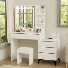 a white dressing table with drawers and stools in front of a large window,