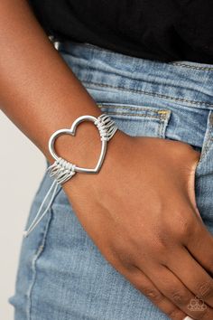 Layers of gray cords delicately knot around an oversized silver heart charm, creating a whimsical centerpiece around the wrist. Features an adjustable sliding knot closure. Sold as one individual bracelet. P9WH-SVXX-214XX Squirrel Jewelry, Sliding Knot Closure, Paparazzi Accessories Jewelry, Heart Strings, Knot Bracelet, Paparazzi Accessories, Women Accessories Jewelry, Silver Heart, Infinity Bracelet