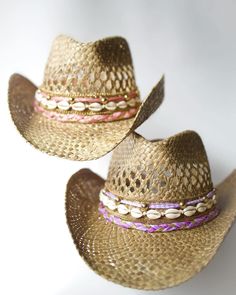 Did someone say coastal cowgirl summer??? Beach day? Country concert? Girls trip? Our handmade cowgirl hats are the PERFECT accessory for any outfit! These tan straw cowgirl hats are decorated with your choice of color ribbon, gold/silver ribbon, plain cowrie shells, & gold/silver chain. Handmade Gold Summer Hats, Southern Style Summer Hats For Western-themed Events, Adjustable Gold Straw Hat For Kentucky Derby, Bohemian Gold Hat For Kentucky Derby, Gold Bohemian Hat For Kentucky Derby, Gold Western Hat Band For Kentucky Derby, Western Gold Hat Bands For Kentucky Derby, Gold Festival Hat Bands For Summer, Pink Western Straw Hat For Rodeo