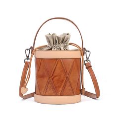 a brown bucket bag with two draws on it