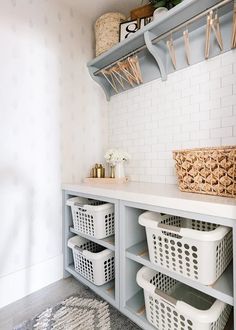 the laundry room is clean and ready to be used as a storage area for clothes