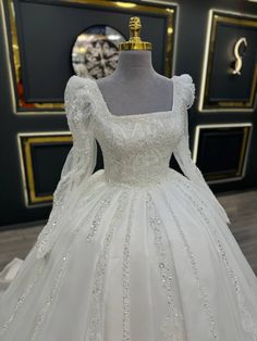 Regal Wedding Dress with Square Neckline and Beaded Long Sleeves Modest Princess Wedding Dresses, Modest A Line Wedding Dress, Wedding Dress Square Neckline, Wedding Dresses Square Neckline, Long Sleeve Wedding Dress Ball Gown, Wedding Dresses Aesthetic, 1950s Ball Gown, Square Neckline Wedding Dress, Wedding Gown With Sleeves