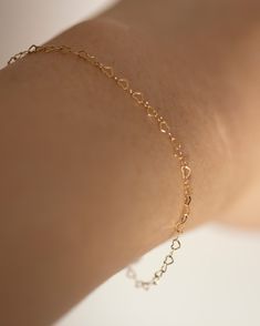 Perfect Valentines gift for that special someone.Mini heart link chain bracelet.Material:• 14k gold filled Size:• Mini heart measures about 3x2mmPerfect for adding a shine to your outfit.Simple and delicate bracelet - Perfect for Stacking & Layering or even alone. Dainty Delicate Chain Bracelets For Valentine's Day, Dainty Delicate Chain Bracelet For Valentine's Day, Delicate Heart Bracelet With Delicate Chain, Minimalist Heart Bracelet With Adjustable Chain For Anniversary, Delicate Heart-shaped Bracelets With Adjustable Chain, Dainty Heart Bracelet With Adjustable Chain For Wedding, Delicate Rose Gold Heart Bracelet For Everyday Wear, Delicate Rose Gold Heart Bracelet For Everyday, Hypoallergenic Dainty Heart Bracelet