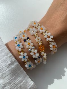 cute beaded bracelets in daisy design Daisy Beaded Bracelet | different colors: gold, white, rose, orange, blue | Daisy | Pearls | Pearl Jewelry | Miyuki / glass beads Handmade White Crystal Bracelet With Flower Shape, Handmade White Crystal Bracelet In Flower Shape, Handmade White Crystal Flower Bracelet, Dainty White Gemstone Beads Bracelet, White Delicate Beaded Bracelet, Handmade White Crystal Bracelet For Friendship, Delicate White Adjustable Crystal Bracelet, White Friendship Bracelets With Faceted Round Beads, Handmade White Crystal Adjustable Bracelet