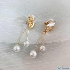 OrcaJump - Exquisite Leaf Earrings - Crafted from High-Quality Alloy - Adorned with Pearls - Incorporating both Clip-on and Stud Variants White Dangle Clip-on Pearl Earrings, White Dangle Pearl Clip-on Earrings, White Pearl Dangle Clip-on Earrings, White Metal Clip-on Pearl Earrings, White Clip-on Metal Pearl Earrings, Clip-on White Pearl Earrings, White Dangle Clip-on Hoop Earrings, Earring Crafts, Leaf Earrings