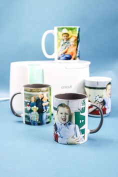 three coffee mugs with different pictures on them