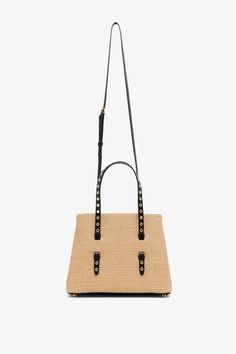 Beige and black raffia tote bag from Alaia. The Mina tote bag has two top-handles, an optional crossbody strap, along with a detachable zipped pouch inside.Measurements: L25 x H19.5 x W12.5 cmPlease note the Mina bag no longer includes a small mirror insideMade in Italy Raffia Tote Bag, Small Mirror, Beige And Black, Small Mirrors, Crossbody Strap, Handles, Pouch, Tote Bag, Italy