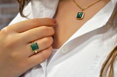 Noble, feminine, special ... Extraordinary, square ring with a green colored jade gemstone in a gold-plated 925 sterling silver setting. The geometric shaped ring gives your outfit the perfect addition. The jade healing stone ensures harmony and balance. You can also give the ring away to your loved ones. It is well suited as a Mother's Day present, as a birthday present or as a Christmas present. Of course, you can also give yourself a present! If you would like to combine this piece of jewelery with suitable earrings and necklace you can find them under the following links: https://www.etsy.com/de/listing/1098150310/925-sterling-silber-jade-ohrringe-grun?ref=listings_manager_grid https://www.etsy.com/de/listing/1112082999/925-sterling-silber-kette-mit?ref=listings_manager_grid - Size: ad Minimalist Jade Gemstone Jewelry, Elegant Everyday Jade Jewelry, Minimalist Emerald Jewelry For Formal Occasions, Modern Jewelry With Rectangular May Birthstone, Modern Rectangular May Birthstone Jewelry, Modern Jade Jewelry For Anniversary, Modern Gold Emerald Ring Gift, Square Cut Emerald Ring In Sterling Silver, Modern Emerald Ring With Polished Finish As Gift