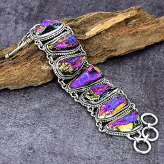 Rainbow Titanium Druzy Bracelet, Raw Druzy Silver Plated Bracelet, Bohemian Bracelet, Rainbow Quartz Handmade Bracelet For Anniversary Gift Please note : As this stone is natural, texture of every stone is different. so, the product you get in hands may slightly vary from the picture shown and not exact same as picture . And this is the beauty of each necklace being different than other. ♥ Crafted with the help of trained and experienced artisans team ♥ Our products are handmade with quality gem Silver Fusion Bracelets For Festivals, Unique Handmade Silver Crystal Bracelet, Silver Fusion Style Bracelets For Festival, Fusion Style Silver Bracelets For Festival, Multicolor Nickel Free Metal Bracelets, Adjustable Spiritual Sterling Silver Bracelet, Silver Beaded Bracelet With Oyster Design, Handmade Multicolor Metal Bracelets, Fusion Style Metal Bracelet As A Gift