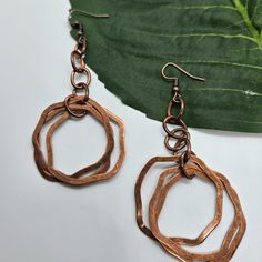 Vintage Copper Dangle Earrings Bohemian Rose Gold Dangle Jewelry, Handmade Copper Drop Earrings, Hand Forged Copper Dangle Hoop Earrings, Nickel Free Copper Chandelier Earrings As Gift, Hand Forged Copper Hoop Earrings With Dangle, Nickel-free Rust Drop Earrings, Nickel-free Copper Chandelier Earrings As Gift, Single Copper Drop Earring, Nickel-free Rust-colored Metal Jewelry