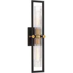 a wall light that is black and gold