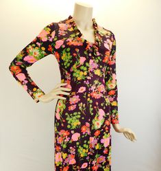 "Vintage 70s long sleeve floral maxi dress, deep wine with pink and orange floral. Sweet 70s maxi dress with long sleeves with ruffled V neck and hem. Full metal zipper in the back. It has a fitted bodice and drapes beautifully. I believe it's a polyester blend and does have some stretch to it. Measured flat  Shoulders 15\" Sleeve 22\" Underarms 16\" 32\" bust waist 14\" 28\" waist Hips 18\" 36\" hip Length 54\"" Stretch Maxi Dress For Garden Party, Fitted V-neck Maxi Dress For Fall, Vintage V-neck Floral Dress For Spring, Spring Party Vintage Maxi Dress, Fall Fitted V-neck Maxi Dress, Vintage Fitted V-neck Midi Dress, Chic Fitted Spring Vintage Dress, Chic Fitted Long Floral Dress, Bohemian Fitted Maxi Floral Dress