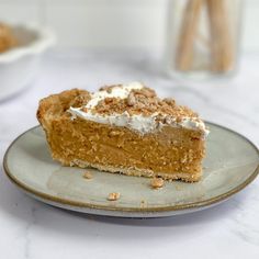 a slice of pumpkin pie on a plate