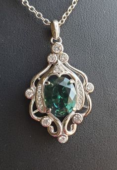 "Amazing Color-Change Synthetic Alexandrite, Green To Purple, See Video! 8x10mm Gem, 925 Sterling Silver Chandelier Design Pendant With 9 Cubic Zirconias, 18\" Sterling Chain. Chain Length Options Available By Messaging Seller At Time Of Purchase. Great Gift! *In Video, My Wife Walks From Kitchen Fluorescent/White Lighting To Natural Lighting From Window. Color Changing Effects Vary With Lighting." Alexandrite Jewelry, Blue Opal Ring, Silver Chandelier, Gothic Accessories, Diamond Rings Design, Halo Pendant, Silver Art, Watch Necklace, Blue Opal