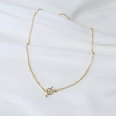 "14K Gold Toggle and Rolo chain necklace *The chain, toggle clasp and all components are 14K yellow gold (If you order a 16\" necklace, it will be a toggle clasp plus chain will be 16\".) The toggle clasp is about 12mm. 2.3mm Rolo chain Please read our policies before you place your order. https://www.etsy.com/shop/SashJewelry/policy?ref=shopinfo_policies_leftnav To see other Mother daughter necklace set click here: https://www.etsy.com/shop/SashJewelry?section_id=12441134&ref=shopsection_le Everyday Gold Lariat Necklace With Lobster Clasp, Gold Oval Link Toggle Necklace With Adjustable Chain, Gold Link Toggle Necklace With Delicate Chain, Gold Minimalist Chain Link Toggle Necklace, Gold Minimalist Toggle Chain Link Necklace, Classic Toggle Necklace With Oval Link Cable Chain, Gold Chain Link Toggle Necklace In Minimalist Style, Dainty Gold Toggle Necklace With Lobster Clasp, Gift Toggle Necklace With Delicate Chain