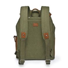 The Milo Backpack is a blend of functional fashion and craftsmanship, designed for the dynamic individual. Made from durable 100% cotton canvas with genuine leather accents, it withstands everyday use. Featuring multiple pockets, an adjustable drawstring closure, recycled nickel-free hardware, and vegetable-based dyes, it highlights eco-friendly style. Versatile carrying options include a top handle and adjustable shoulder straps. Ideal for commutes, getaways, and adventures, the Milo Backpack offers ample storage, including a padded laptop compartment. Handcrafted for unique quality, it is an essential accessory for the modern explorer. Dimensions: 12" W x 15" H x 5" D. | TSD Brand Milo Backpack Green Canvas Bag For Outdoor, Casual Green Canvas Backpack, Khaki Cotton Canvas Bag For Travel, Functional Leather Backpack With Pockets For Outdoor Activities, Modern Canvas Backpack With Adjustable Strap, Utility Canvas Bags For Outdoor Activities, Utility Backpack With Pockets For Outdoor, Casual Canvas Bag With Leather Trim For Travel, Casual Leather Backpack With Adjustable Strap For Outdoor