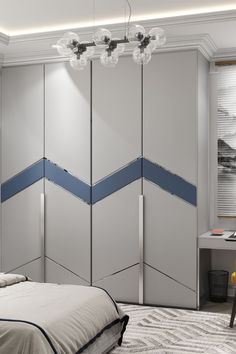 a bedroom with white walls and blue trim on the closet doors is pictured in this image