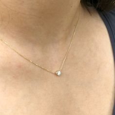 Elevate your style with this luxurious yet minimalist solitaire diamond necklace. Crafted with a 5mm round cut diamond, bezel set in solid 14k white, yellow or rose gold. A perfect accent to your everyday wear and perfect for April birthdays. Enjoy the beauty of natural diamonds! Choose between a 16" and 18" chain so we can make sure your pendant is perfectly centered! Solitaire Diamond Necklace, Phone Items, April Birthday, Diamond Solitaire Necklace, April Birthstone, Solitaire Diamond, Round Cut Diamond, Diamond Solitaire, Bezel Setting