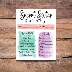 the secret sister survey card is shown on a wooden table with wood planks behind it