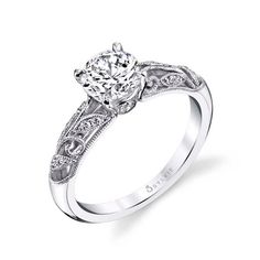 a white gold engagement ring with an intricate filigree design on the shan shan shan shan shan shan shan shan shan shan shan shan shan shan shan shan shan shan shan shan shan shan shan shan shan shan shan shan shan shan