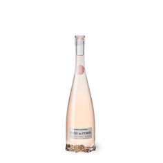 a bottle of pink wine on a white background