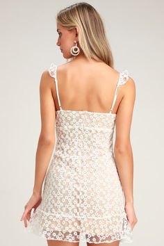 Lulus Exclusive! The Lulus Charmaine White Embroidered Mini Dress is sweet and simply divine! This femme little frock is formed from sheer mesh (atop a nude knit liner) embellished with ditsy floral embroidery. Ruffle trim accents the adjustable straps and tying keyhole neckline, while seamed cups meet with an empire waist. The figure flaunting silhouette ends at a ruffle-trimmed mini hem. Hidden back zipper/clasp. Fit: This garment fits true to size. Length: Above mid-thigh. Size medium measure Feminine Fitted Mini Dress With Delicate Lace, Delicate Lace Mini Dress For Brunch, Feminine Sleeveless Mini Dress With Delicate Lace, Feminine Mini Dress With Delicate Lace For Brunch, Spring Fitted Lace Dress With Spaghetti Straps, Fitted Delicate Lace Dress For Brunch, Spring Mini Dress With Delicate Lace For Brunch, Delicate Sleeveless Spring Dress, Delicate Sleeveless Dress With Lace Trim