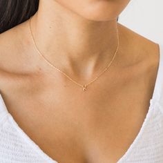 Tiny, dainty, and adorable, this Tiny Initial Necklace will be your new go-to. It's personalized just for you - wear your own initial or that of a special someone in your life. You can wear it everywhere - from your morning coffee run all the way to girl's night out. Yes - that includes the gym and the shower too! DETAILS Necklace length: 16" with 2" extender 14k gold vermeil -or- sterling silver charm - 5mm tall 14k gold filled -or- sterling silver chain, findings, & spring clasp Safe for sensi Dainty Gold Initial Necklace, Tiny Initial Necklace, Dainty Letter Necklace, Dainty Initial Necklace Gold, Initial Necklace Aesthetic, Necklace From Boyfriend, K Necklace, Initials Necklace, J Necklace