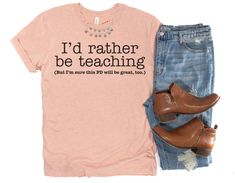 "Funny Teacher Shirts - Inservice Day T-Shirts for Teachers - I'd Rather Be Teaching Professional Development Shirt The Shirt ------ This premium t-shirt is soft and lightweight with just a little bit of stretch.  The unisex cut is flattering for both men and women as well as for a variety of body types.  Fit ------ Generally this shirt runs true-to-size, but if you're in between sizes or prefer your shirts roomier, size up! Please note that while the sizing says \"men's,\" this really is a unis Funny Teacher Shirts Zazzle, Teacher Break Shirt, Teacher's Outfits, Funny Teacher Shirts, Funny Teachers, School Attire, Class Shirts, Teacher Wardrobe, Cricut Shirts