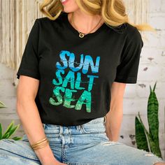 Sun Salt Sea Beach Shirt, Beach Shirt, Summer Shirt, Summer Vibes, Beach Party Shirt, Beach Vibes, Family Beach Shirt, Shirt for the Beach --How To Order-- 1-) Please, Check and Review all Photos. 2-) Choose Your T-Shirt Size and Model From the "Size" Menu. 3-) Choose Your T-Shirt Color from "Primary Color" Menu. 4-)Choose the quantity as much as you want. 5-) Click ADD TO CART. You can go back to add more product color for your family members anytime you want, or you can complete the checkout process. 6-) Please click the "Proceed to Check Out" button 7-) Finally, Processing time is 1-3 days. Shipping time is based on the shipping type you'll select at checkout. -When you check out, you can add a note to seller for any request. -The shirts are very high quality and super soft comfortable Short Sleeve Shirt For Beach Vacation, Black Crew Neck Camp Shirt For Summer, Black Summer Shirt For Vacation, Black Beachy Tops For The Beach, Tropical Print T-shirt For Beach Season, Tropical Print T-shirt For Beach In Summer, Casual Beach Vacation Camp Shirt, Casual Camp Shirt For Beach Vacation, Casual Beach Party Shirt