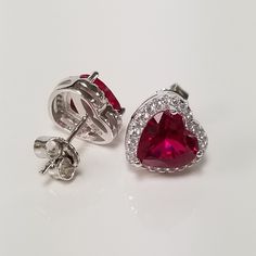 "Thanks for shopping our vintage estate store. We tend to sell well below wholesale and truly hope you enjoy all of our items. Many of the items are one of a kind, so please enjoy scrolling through the pictures and hopefully something will catch your eye. Brown spots are from camera. Estate Sterling Silver 925 created 2cts ruby heart diamond studs with cz diamonds. The studs are stunning. Retails $59 on sale $29 Size: 3/8\" 10mm Weight: 3.39 grams Carat: 1ct per studs Nice earrings, some that yo Red Earrings Stud, Princess Earrings, Diamond Princess, Ruby Heart, Red Studs, Halo Stud Earrings, Halo Earrings Studs, Heart Women, Earrings Studs