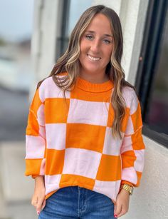 This vibrant Orange Checkered Sweater Top is a must-have for every wardrobe! Comfy and stretchy, it can be styled with anything for a cute and versatile look. Perfect for all seasons and all ages. Check the sizing chart for the perfect fit. Available in Orange + Green Trendy Oversized Color Block Sweater, Trendy Color Block Sweater, Trendy Multicolor Stretch Sweater, Trendy Stretch Multicolor Sweater, Trendy Fall Sweater With Color Matching, Spring Trendy Sweater With Color Matching, Trendy Plaid Sweater For Fall, Orange Fitted Trendy Sweater, Trendy Fitted Orange Sweater