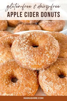 there are several sugared apple cider donuts on the plate with text overlay that says glutterfree and dairy - free apple cider donuts