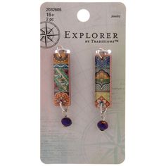 the earrings are decorated with colorful designs