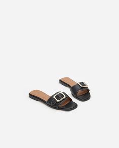 Mimi Leather Black – Flattered Luxury Summer Slides With Tang Buckle, Elegant Leather Slides With Buckle Closure, Luxury Black Sandals With Rectangular Buckle, Classic Leather Sandals With Rectangular Buckle, Luxury Open Toe Slides With Tang Buckle, Luxury Open Toe Slides With Buckle Closure, Elegant Open Toe Slides With Buckle Closure, Formal Leather Sandals With Gold Buckle, Luxury Summer Mules With Buckle Closure