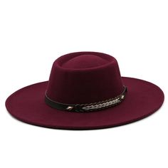 Elevate your look with our fashionable Fedora Hat, a timeless accessory that adds sophistication and charm to any outfit. Crafted with meticulous attention to detail, this classic Fedora boasts a sleek and structured silhouette, perfect for both men and women alike. Key Characteristics: Sleek Design: The hat boasts a sleek and modern design, perfect for urban settings and stylish city dwellers. Versatile Fashion Accessory: This Fedora hat is a versatile fashion accessory that effortlessly complements a wide range of outfits, from casual streetwear to more formal attire. Urban Chic: With its combination of classic Fedora style and contemporary urban aesthetics, this hat embodies urban chic and sophistication. Comfortable Fit: Designed for comfort, the hat provides a snug yet comfortable fit Fedora Hats For Women, Cowboy Hat Styles, Fedora Style, Felted Hat, Brimless Hat, Womens Fedora, Dress Men, Fedora Hat Women, Trilby Hat