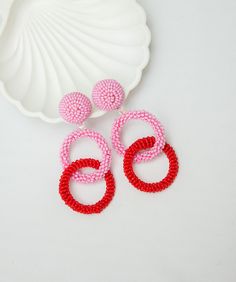 Pink and Red Hoop earrings. Ideal for evening and daily look. Round dangles earrings made of high-quality beaded and rings. CUSTOM ORDER It is Fully HANDMADE earrings and if you want to purchase this earring in a different color or size, send me please a direct message. If you have any questions don't hesitate to ask me. Please visit my shop to see more models made by me https://www.etsy.com/shop/LaranBijou DIMENSIONS Length - 8cm (3inch) Weight 15 grams Clip-On earrings Stud earrings SHIPPING I Trendy Red Circular Jewelry, Pink Small Hoop Beaded Earrings As Gift, Red Hoop Earrings For Summer, Trendy Pink Hoop Earrings With Round Beads, Red Round Beaded Party Earrings, Trendy Red Hoop Earrings, Pink Hoop Beaded Earrings, Red Small Hoop Earrings For Summer, Pink Hoop Earrings With Colorful Beads