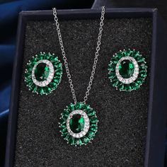 Make a stunning statement with this exquisite jewelry set, featuring a captivating emerald green cubic zircon necklace and earrings. Whether you're attending a wedding, a special event, or simply want to add a touch of sophistication to your ensemble, this set is the perfect choice. Key Features: Designed for the trend-conscious individual Elegant geometric shape and pattern Suitable for weddings and other special occasions Made of high-quality copper and adorned with shimmering cubic zirconia I Emerald Green Jewelry, Emerald Green Necklace, Bridal Jewelry Set, Zirconia Necklace, Cubic Zirconia Necklace, Cubic Zirconia Jewelry, Green Jewelry, Necklace And Earrings Set, Necklace And Earring Set