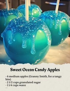 blue and green candy apples on a white plate with text that reads sweet ocean candy apples