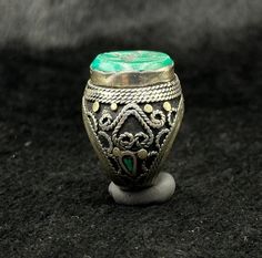 Green Round Inlay Jewelry, Traditional Turquoise Inlay Ring, Traditional Handmade Silver Turquoise Ring, Unique Green Jewelry For Ceremonial Occasions, Engraved Turquoise Rings As Gift, Traditional Silver Turquoise Ring, Traditional Turquoise Gemstone Ring, Traditional Silver Turquoise Ring With Inlay, Antique Handmade Green Ring