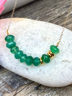 Gold filled Necklace with Emerald green onyx gemstones beads, love gift, Valentine's Day gift, mom gift, birthday gift * Gold filled chain: small oval links made from flattened wire shine as they catch the light. * 8mm Natural Emerald green onyx ( light- medium color ) Emerald green onyx is the birthstone of May. the symbol of love, hope and harmony Beautiful rich color. Great price!! Beautiful quality My jewelry will be wrapped in a beautiful gift box ready to gift. Please visitor my entire sto Green Faceted Beads Jewelry As Gift, May Birthstone Gemstone Beads Jewelry Gift, Green Faceted Beads Jewelry For Gift, Green Dainty Jewelry With Faceted Beads, Emerald Jade Necklace With Natural Stones As Gift, Emerald Necklace With Natural Round Beads For Gift, Emerald Necklace For Everyday Wear - May Birthstone, Emerald Necklace With Round Natural Stones For Gifts, Emerald Necklace With Round Natural Stones As Gift