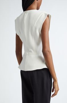 Teensy cap sleeves and a curvy peplum shape this cleanly seamed top carved with a deep V-neck. Hidden back-zip closure Deep V-neck Cap sleeves 70% triacetate, 30% polyester Dry clean Imported Designer Clothing Elegant Tops With Padded Shoulders For Spring, Elegant Spring Top With Padded Shoulders, Elegant Fitted Top With Padded Shoulders, Elegant Fitted Tops With Padded Shoulders, Elegant Tailored Sleeveless Tops, Fitted Elegant Peplum Top For Work, Elegant Fitted Peplum Top For Work, White Fitted Structured Top, Elegant Structured Tops For Workwear