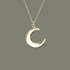 Moon necklace, crescent moon pendant, celestial, sea shell necklace, moon goddess, a mother of pearl moon on a 14k gold filled chain A one of a kind, mother of pearl crescent moon hanging peacefully from a 14k gold filled chain in the length of your choice! The moons measure aprox 20mm. Need a few reasons to love Mother of Pearl other than for its beauty? ♥ Protection ♥ Calming Mother of Pearl is a 1st Anniversary gemstone. Planet - Moon, Neptune A protection stone, Mother of Pearl brings the ge White Moon Shaped Mystical Necklace, Mystical Moon Shaped White Necklace, White Moon Phase Necklace, Mystical White Moon Necklace, Mystical White Moon-shaped Necklace, White Celestial Necklace With Moon Phase, White Moon Phase Celestial Necklace, White Celestial Moon Phase Necklace, White Moon Charm Necklace