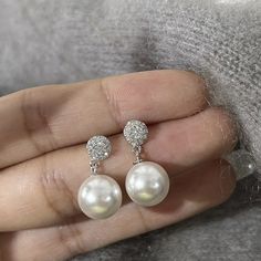 Description: Natural freshwater pearls, AAA zirconia, silver needle-based (natural materials will have unavoidable flaws, please be careful to order; silver needle material is soft, just make it straight to use, which is a normal phenomenon) As it is natural with imperfections, please respect the beauty of nature! White Pearl Crystal Earrings For Pierced Ears, White Pearl Crystal Earrings, Hypoallergenic White Crystal Earrings, White Hypoallergenic Drop Crystal Earrings, Hypoallergenic White Round Bridal Earrings, Elegant White Round Crystal Earrings, White Hypoallergenic Crystal Earrings For Party, White Hypoallergenic Pearl Earrings For Party, White Round Crystal Earrings For Pierced Ears