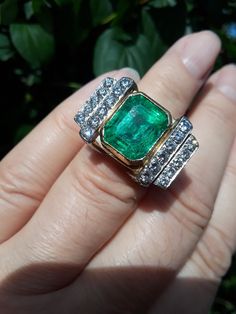 Stunning, Spectacular, Unique, One Of A Kind Ring .. The ring made from 18k Yellow Gold, Approximately 7ct Bright, Green Color, approximately 2ct Diamond ... Antique Box for Display Only .. Very Good Pre Owned Condition. Come with Appraisal $14,000 Formal Octagon Emerald Diamond Ring, Luxury Diamond-cut Emerald Ring For Formal Occasions, Luxury Emerald Ring With Diamond Cut For Formal Events, Luxury Emerald Ring With Diamond Cut For Formal Occasions, Luxury Gold Emerald Ring For Formal Occasions, Luxury Gold Emerald Ring For Wedding, Gia Certified Yellow Gold Emerald Ring For Formal Occasions, Formal Octagon Emerald Ring With Diamond, Formal Emerald Ring With Center Stone Octagon Shape